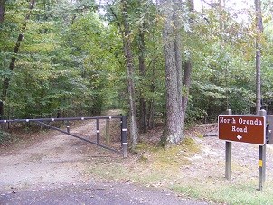 North Orenda Road trail sign and metal gate