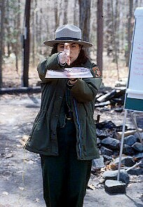 a ranger teaching orienteering