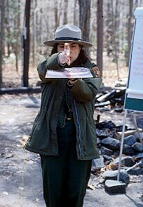 a ranger teaching orienteering