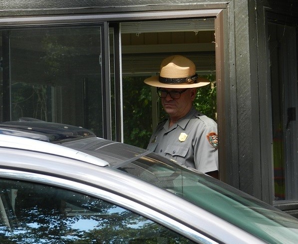 Ranger collecting fees at the entrance station