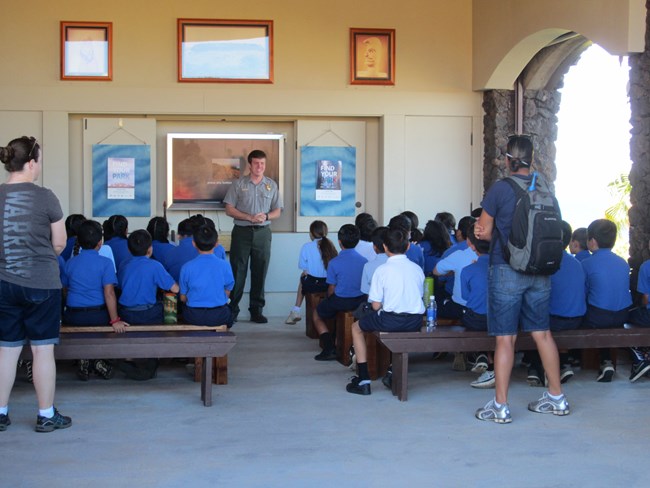 Ranger talking with school group before heading out for a half mile loop trail walk.