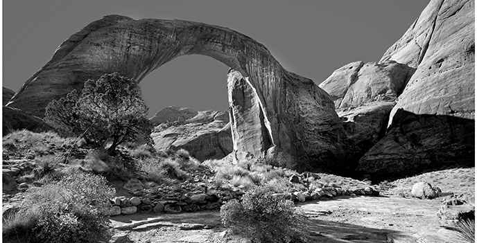 Black & white photo of Rainbow Bridge from the observation area.