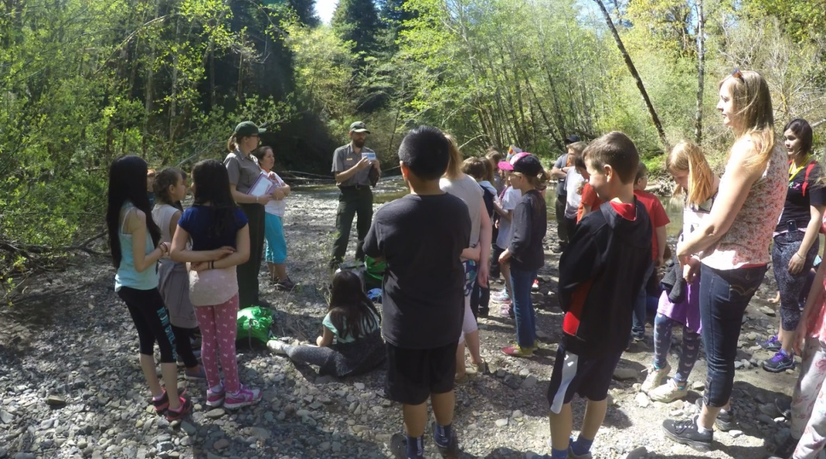 Students gather around a ranger