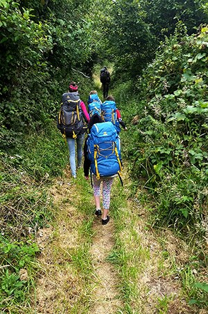 Fourth graders and their families backpacking during the Redwood Family Coastal Camp. Fourth graders and their families backpacking during the Redwood Family Coastal Camp.