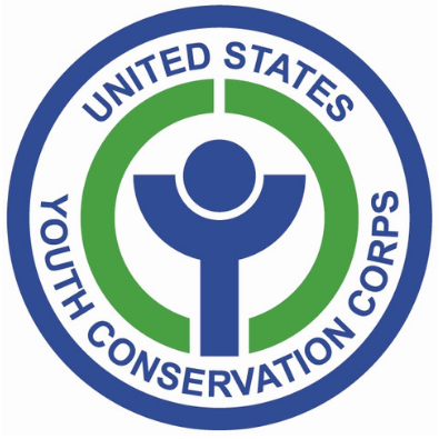 A blue, green, and white logo. A circle encompasses text reading 'United States Youth Conservation Corps'