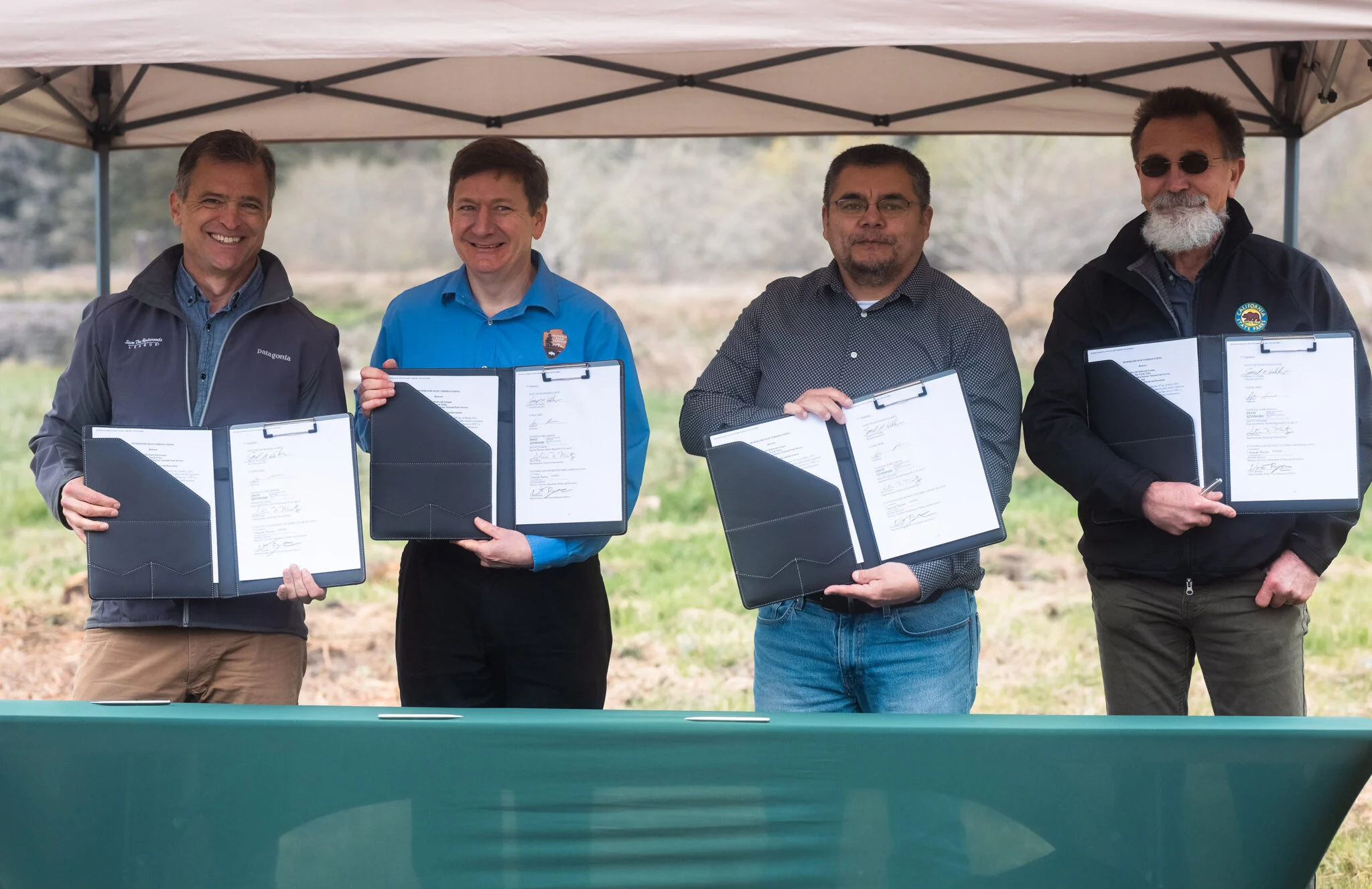 From left: Sam Hodder, president and CEO of Save the Redwoods League; Steve Mietz, superintendent of Redwood National and State Parks; Joseph L. James, chairman of the Yurok Tribe; and Victor Bjelajac, superintendent of California State Parks’ North Coast