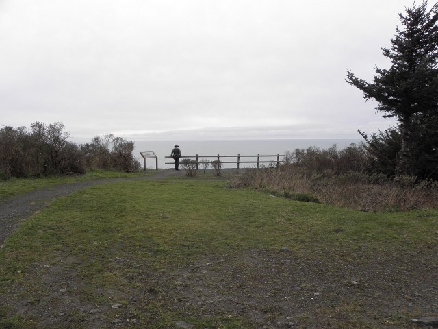trail ends at railing which overlooks the Pacific Ocean