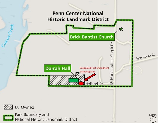 Map with the park boundaries labeled with a green dashed line. Darrah Hall and Brick Baptist Church are highlighted, with a red arrow and circle marking the 1st Amendment Area in front of Darrah Hall