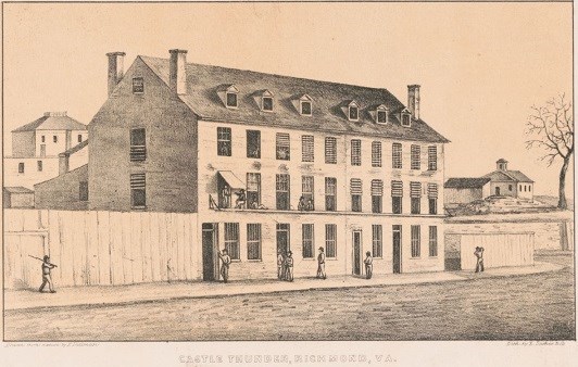 a black and white drawing of a four story warehouse building surrounded by guards.