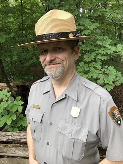 A uniformed park ranger