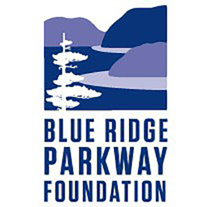 Blue Ridge Parkway Foundation Logo2 A rectangular logo with navy blue text that says, "Blue Ridge Parkway Foundation", below a graphic of rolling mountains, a tree, and a road running at the base of the mountains.