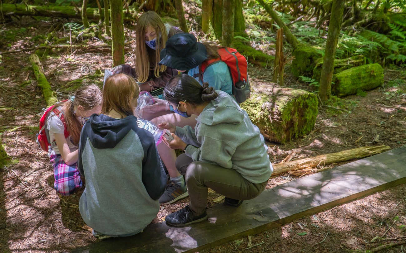 Americorp intern Kahawis teaches Girls in Science Camp.