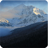 Glacier thumbnail Wispy clouds linger in front of snow-glad Mount Jackson