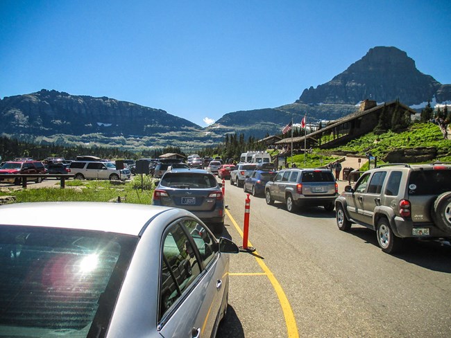Logan Pass traffic Cars wait in line to park at Logan Pass.
