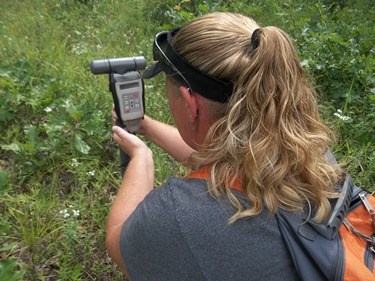 Participant tries her hand using a research tool.