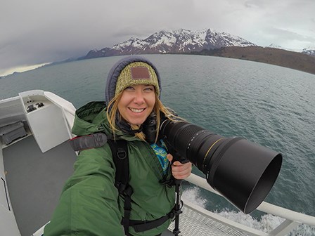 Monica with her camera on a boat in Resurrection Bay.