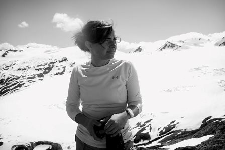 lt= woman in front of glacier