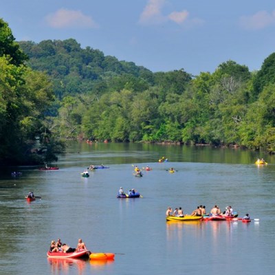 lt= Kayakers enjoy a sunny day on the Chattahoochee River