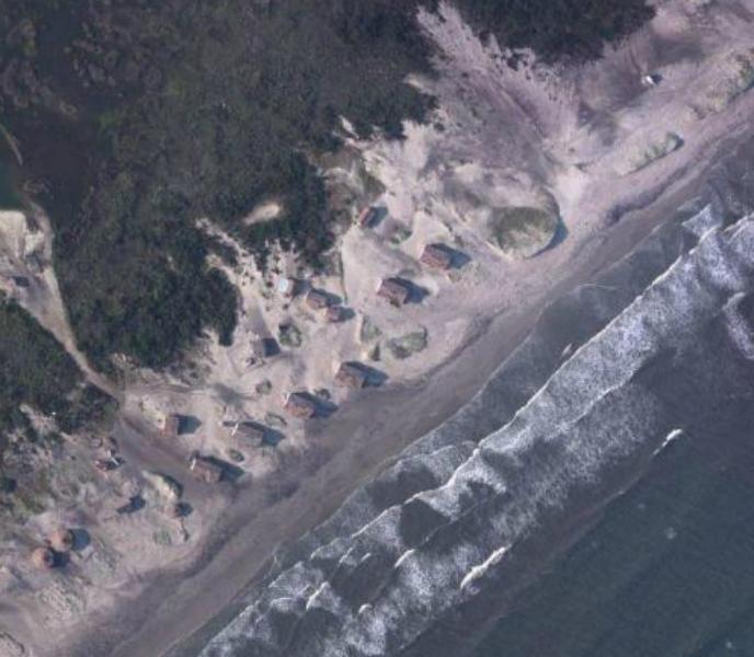 Cabins at Cape Lookout are dangerously close to the coastline as sea levels continue to rise