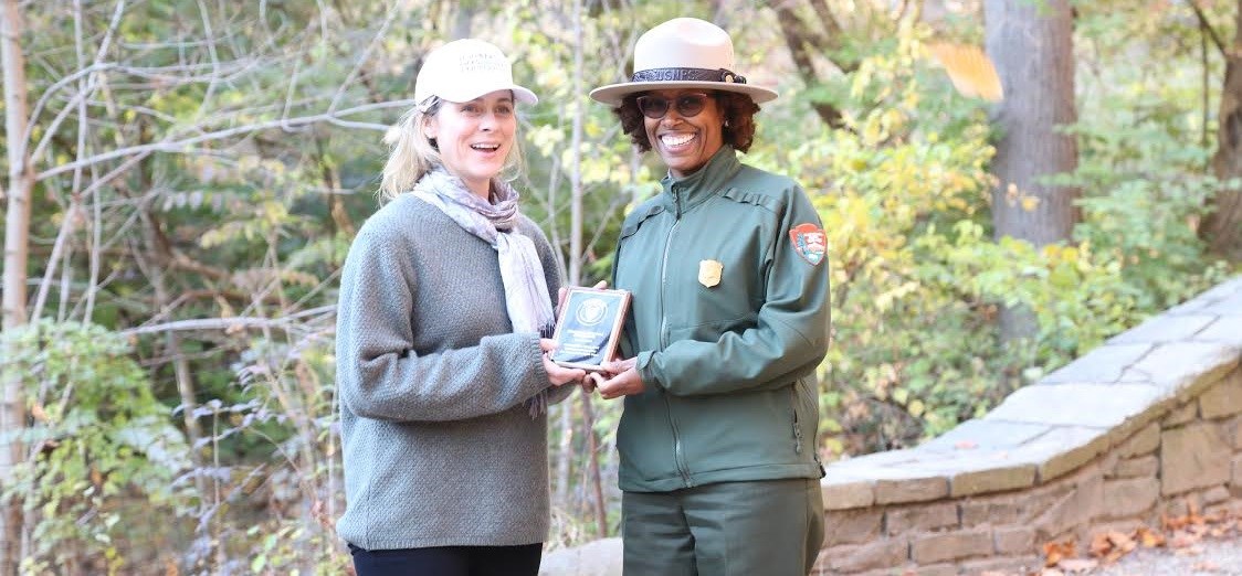 Lindsey Milstein, President, DOPC accepting 2015 Hartzog Regional Award from Tara Morrison, Superintendent, Rock Creek Park (2016)