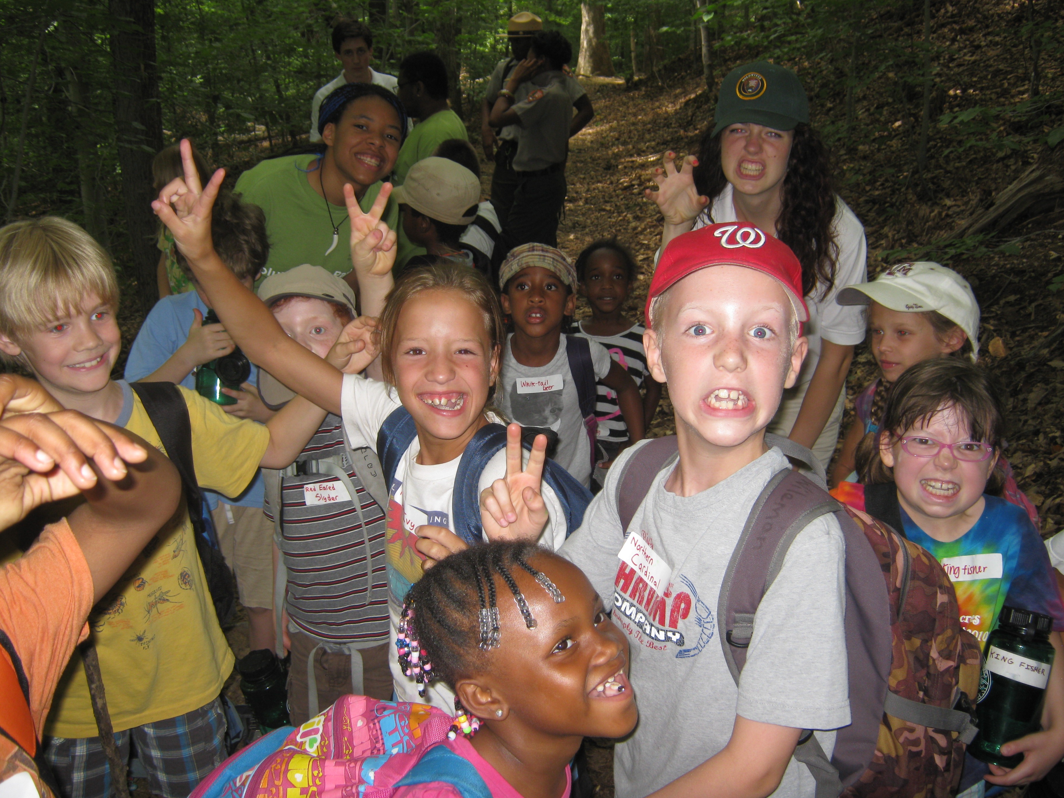 Kids in a group smiling at Junior Ranger camp Kids in a group smiling at Junior Ranger camp