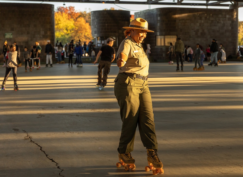 SkatingRangeratAnacostia A park ranger rides roller-skates at the Anacostia roller skating rink.