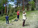 a photo of volunteers listening for olive-sided flycatchers