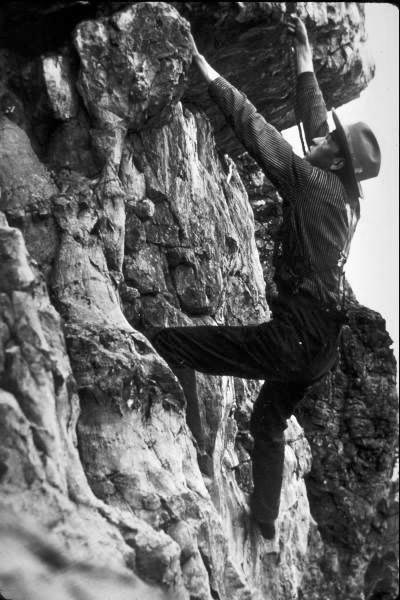 a vintage photo of a mountain climber