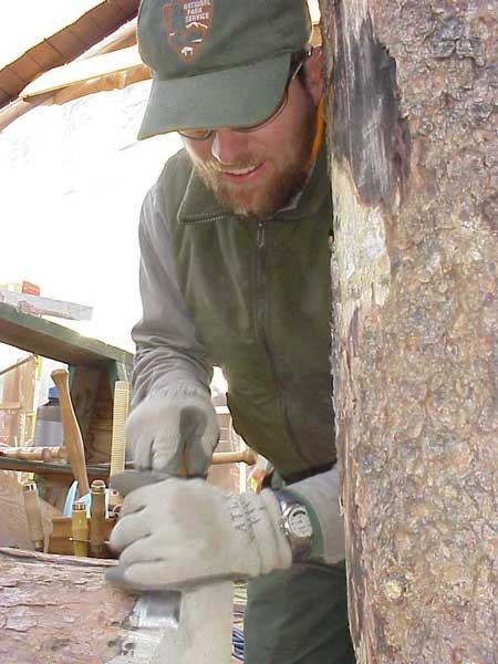 a photo of a craftsman using hand tools