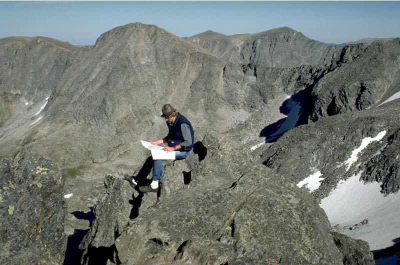 a photo of a hiker on an exposed site