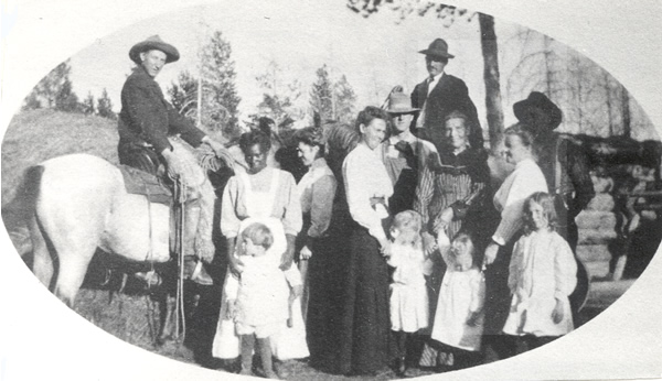 a photo of the Harbison family and friends