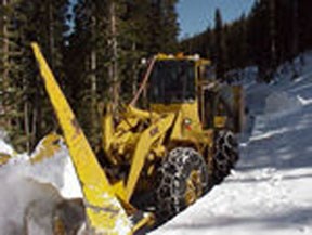 a photo of a  closeup of a snow plow