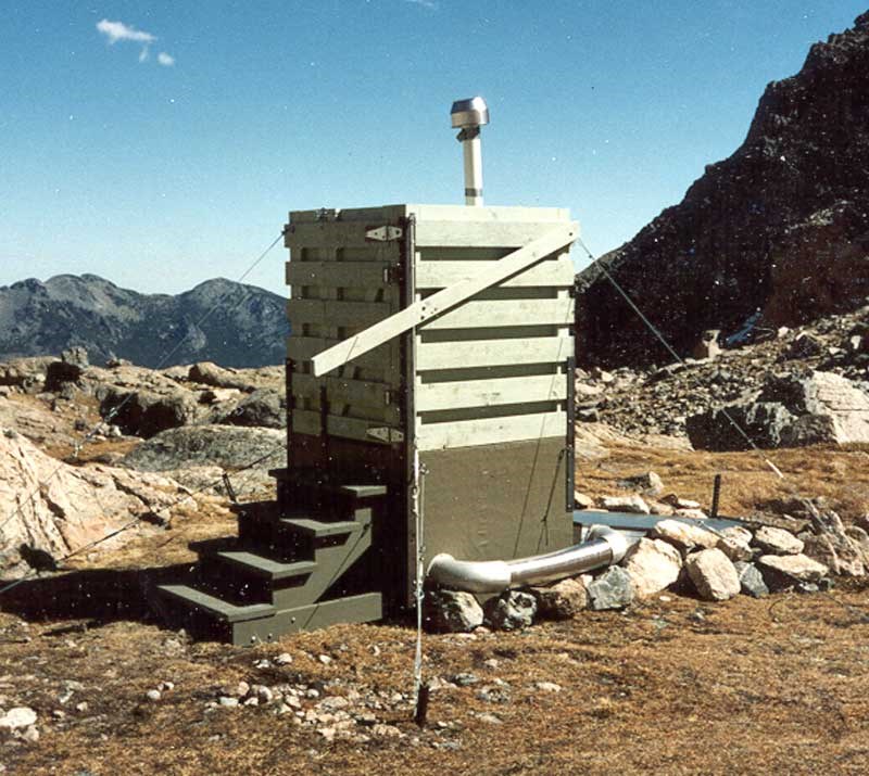 a photo of a backcountry toilet
