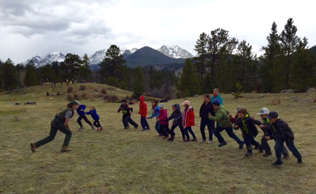Students play an educational game on a field trip to Rocky Mountain National Park. Students play an educational game on a field trip to Rocky Mountain National Park.