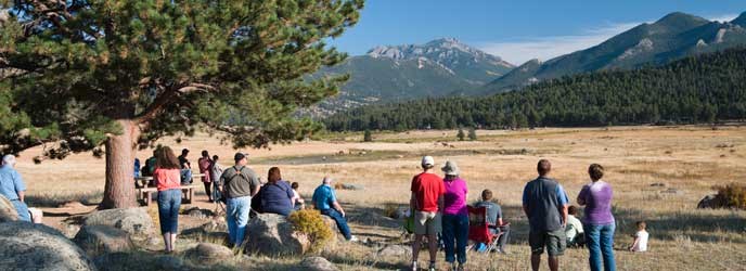 Visitors watch elk during the fall rut Visitors watch elk during the fall rut