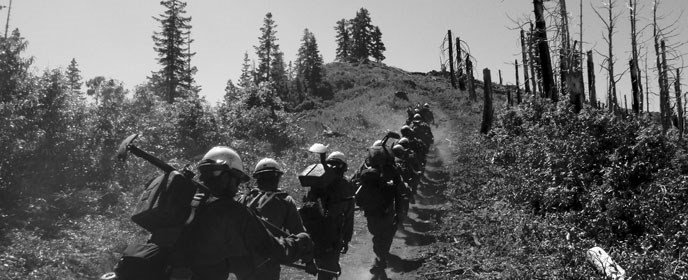 Hotshot firefighters hike in to a fire Hotshot firefighters hike in to a fire