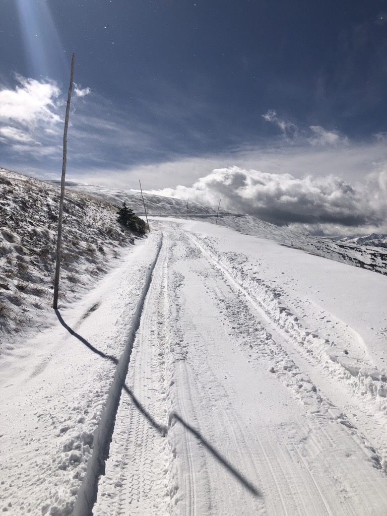 Snow on Trail Ridge Road, October 2023 The surface of Trail Ridge Road is covered with a layer of snow and ice.
