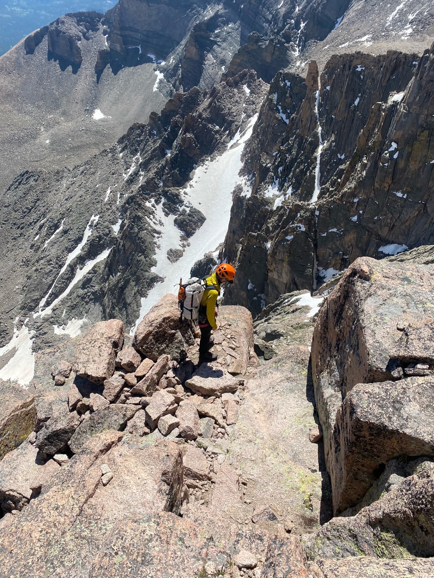A park ranger is working to help rescue a pair of climbers in technical terrain on Longs Peak