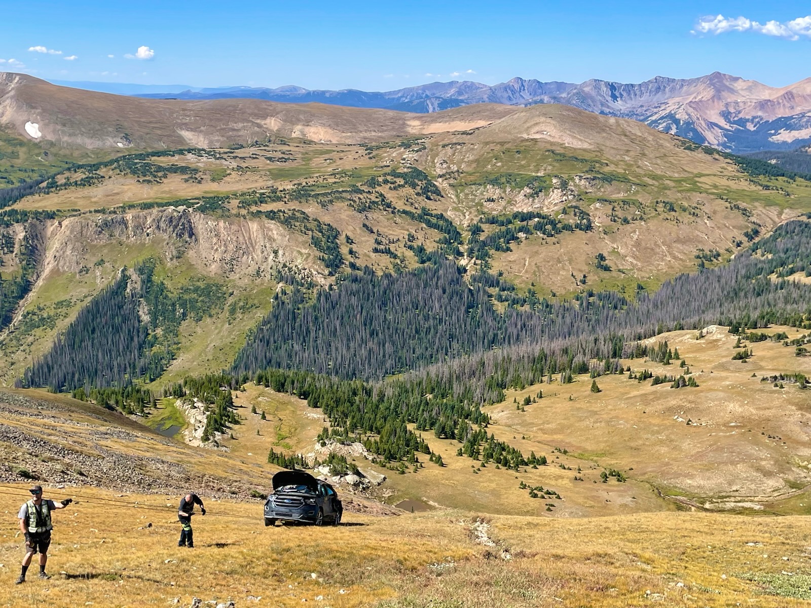 NPS Photo_Park Staff and Tow Truck Staff are working to remove vehicle that drove 500 feet off Trail Ridge Road in Rocky Mountain National Park