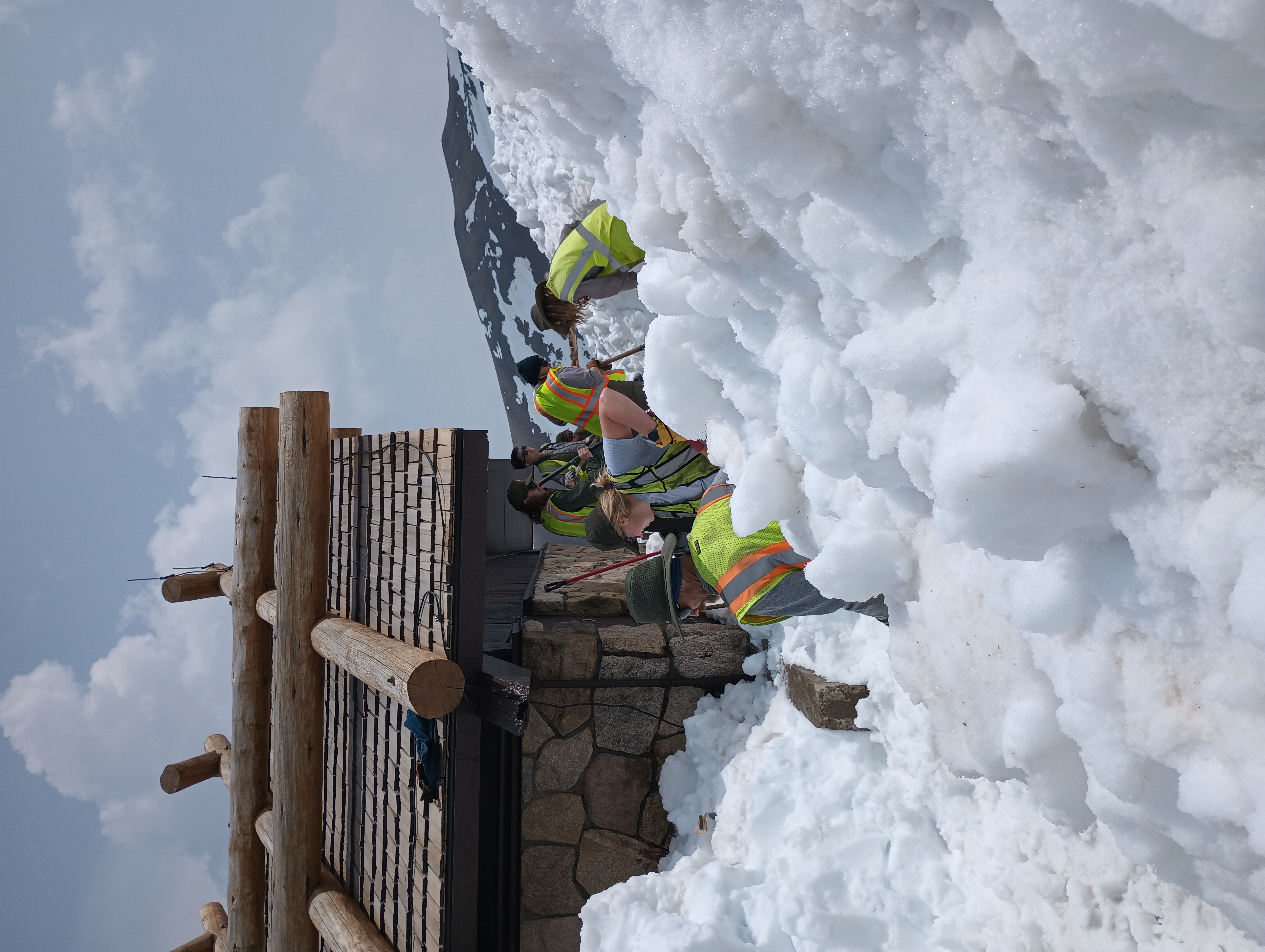 Trail crew digs out Alpine Visitor Center May 23, 2023