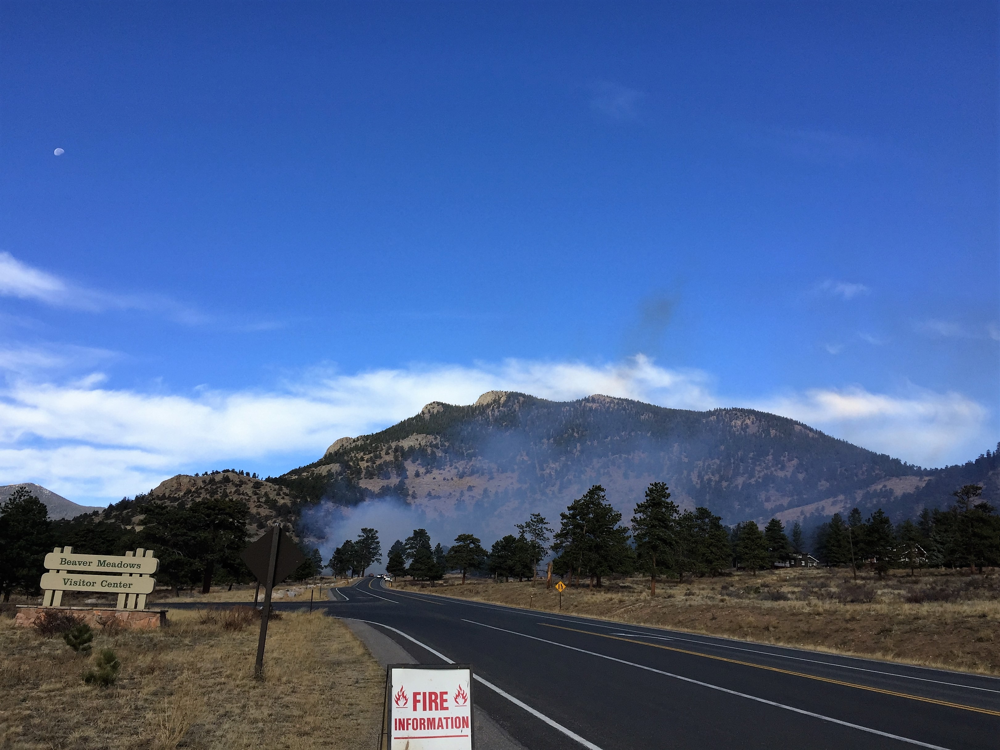 Smoke near Beaver Meadows Visitor Center Smoke seen in the distance from Beaver Meadows Visitor Center during prescribed burn in October 2018.