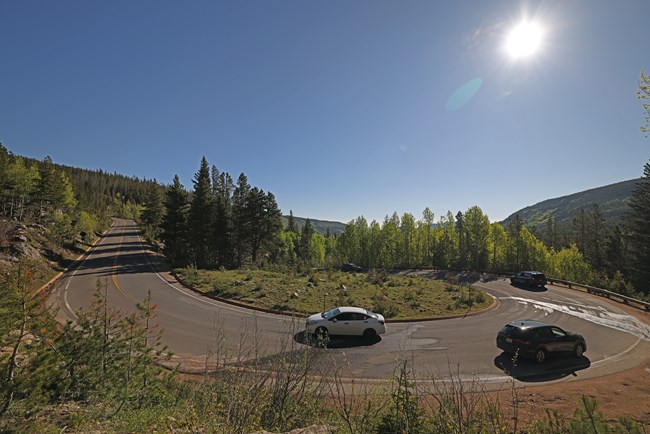 Vehicles Driving on Bear Lake Road in June 2025