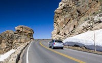 Car approaches Rock Cut on Trail Ridge Road