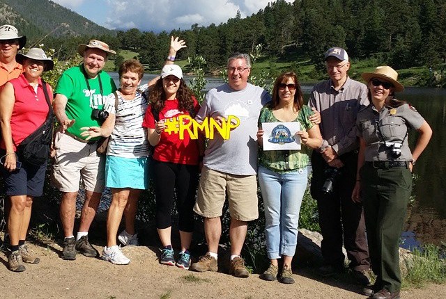 Group of visitors with park ranger on shore of Lily Lake Group of visitors with park ranger on shore of Lily Lake