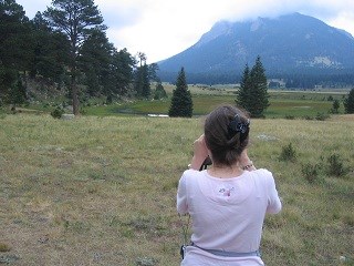 visitor viewing bighorn at Sheep Lakes 320X240