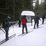 xc skiers at Emerald Lake 