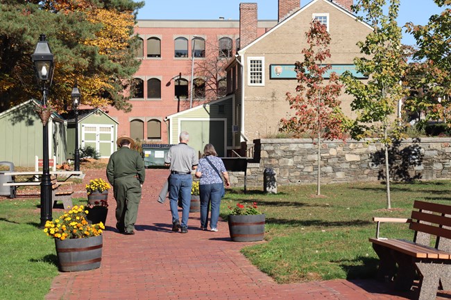 A ranger guiding a small group of visitors