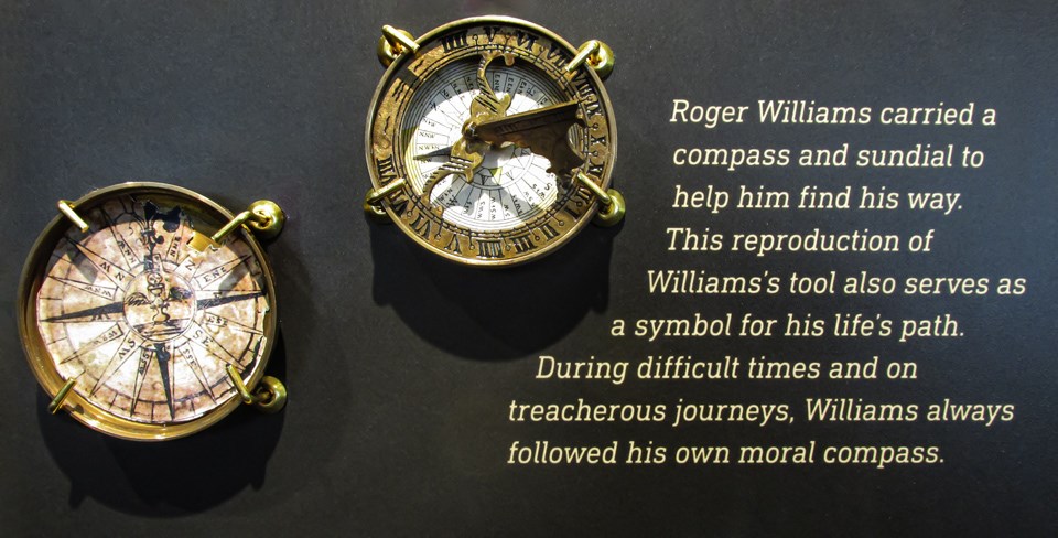 Close up of Roger Williams Compass and a quote