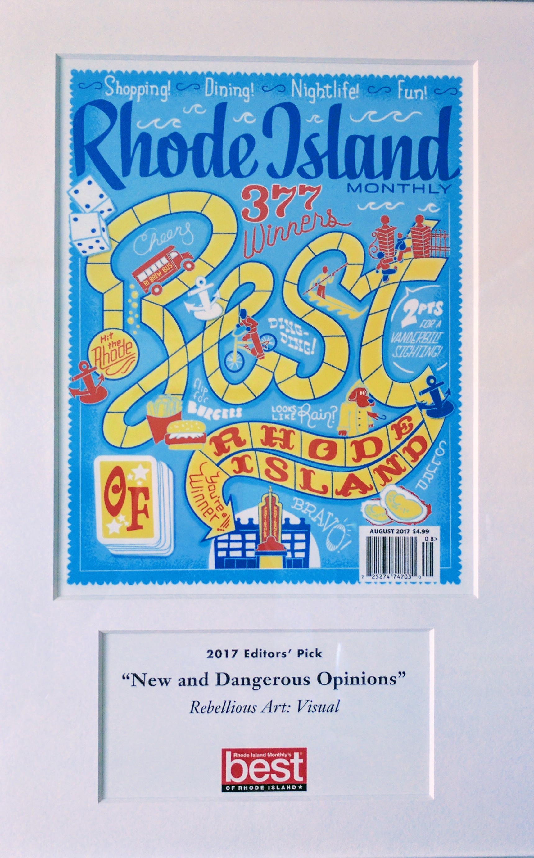 Best of Rhode Island Award Award encased in a silver frame showing front cover of the August 2017 edition of Rhode Island Monthly Magazine. The cover images are bright blues, yellows, and reds show a game board.