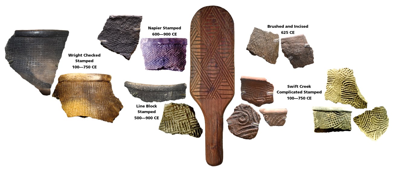Woodland pottery sherd and wooden paddle